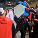 Weaver players douse second-year head coach Ken Cofer with a cooler after the Bearcats beat J.B. Pennington on Friday to lock up a playoff berth. (Photo by Joe Medley)