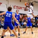 Weaver’s D.J. Marbury drives the lane against White Plains on Friday at Weaver. (Photo by Brad Campbell/For East Alabama Sports Today)