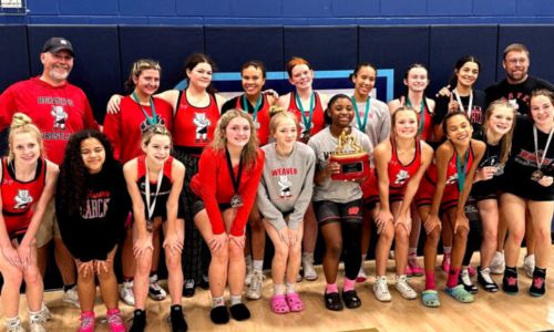 Weaver’s girls’ wrestling team, shown here at Gulf Shores last weekend, swept two duals at Phenix City on Tuesday. (Submitted photo)