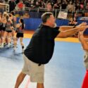 Ohatchee head coach Rebecca Hughes and assistant coach Ronnie Henderson celebrate as their players celebrate after winning a five-set Class 3A semifinal against St. Luke’s on Wednesday at Birmingham CrossPlex. (Photo by Joe Medley)