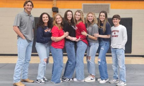 Eight Alexandria athletes signed Tuesday to play their sports in college. They are, from left, baseball’s Bray Goode (South Alabama), softball’s Alyssa Hunt (Wallace State Community College). softball’s Pressley Slaton (Gadsden State Community College), volleyball’s Eryn Spradley (Tennessee Tech), volleyball’s Cassidy Hartsfield (Gadsden State Community College), volleyball’s Kaden Pritchett (Gadsden State Community College), volleyball’s McKinley Cooper (Southern Union Community College) and cross country’s Caleb Gay (Gadsden State Community College). (Photo by Joe Medley)