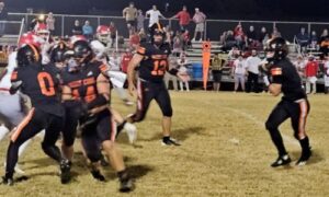 Alexandria’s J.J. Beason rushed for some of his 130 yards against Munford on Thursday at Alexandria. (Photo by Joe Medley)