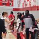 First-year Ohatchee coach Quntarius Hutchison shares a moment with Colby Hester before tipoff Thursday at Ohatchee. The Indians won Hutchison’s first game as a varsity head coach, beating Munford 57-45. (Photo by Joe Medley)