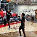 White Plains’ Crew Martin shoots a 3-pointer as Weaver’s Kaden Gooden defends during Friday’s action in the Heflin Holiday Hoops Classic. (Photo by Joe Medley/East Alabama Sports Today)