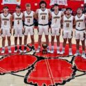 Spring Garden’s boys celebrate after winning the Heflin Holiday Hoops Classic on Saturday. (Photo by Joe Medley/East Alabama Sports Today)