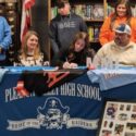 Pleasant Valley softball standout Haylie Lee celebrates her signing with Marion Military Institute during Wednesday’s ceremony in the Pleasant Valley school library, (Photo by Joe Medley)