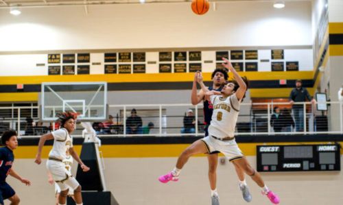 Oxford’s Jaylen Alexander (0) forces a turnover against Bob Jones as teammate Marcus Perry, Jr., looks on Saturday during play in the Larry & Connie Davidson Classic. (Photo by Brad Campbell/sport-shutter.com)