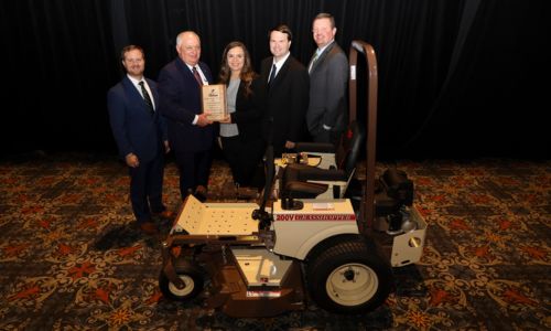 Will and Ali Gotcher of Colbert County were honored as 2024 Excellence in Agriculture contest winners during the Alabama Farmers Federation’s 103rd annual meeting in Montgomery Dec. 9. From left are Federation Young Farmers Division Director Hunter McBrayer; Federation President Jimmy Parnell; the Gotchers; and Corteva Agriscience’s David Rich.