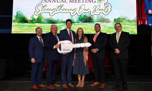 Garrett and Robin Dixon of Lee County were recognized as first runner-up in Alabama’s 2024 Outstanding Young Farm Family (OYFF) contest during the Alabama Farmers Federation’s 103rd annual meeting in Montgomery Dec. 9.