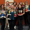 Members of Lambda Alpha Epsilon and their awards from the regional conference. (Photo Courtesy of JSU)