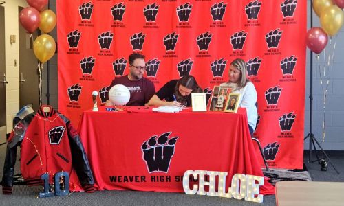 Weaver’s Chloe Collison signs Wednesday to play volleyball for Coastal Alabama Community College. (Photo by Joe Medley/East Alabama Sports Today)