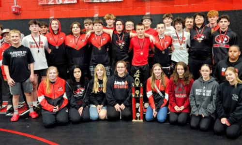 Cleburne County wrestlers celebrate after winning Saturday’s Rumble In The Jungle, at Cleburne County High School. (Photo by Joe Medley/East Alabama Sports Today)