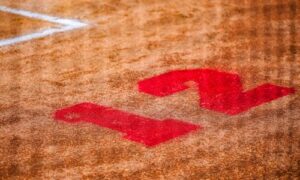 The number 12 is painted behind home plate at Ohatchee High School’s softball field in honor of the late Taylor Hamm during Friday’s action in the Class 3A, Area 11 tournament. (Photo by Brad Campbell/sport-shutter.com)