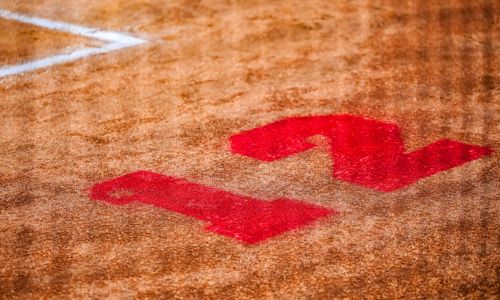 The number 12 is painted behind home plate at Ohatchee High School’s softball field in honor of the late Taylor Hamm during Friday’s action in the Class 3A, Area 11 tournament. (Photo by Brad Campbell/sport-shutter.com)