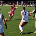 Donoho’s Anna Kate Wallace sizes up a shot against White Plains during Tuesday’s Calhoun County semifinals at Choccolocco Park. (Photo by Joe Medley/East Alabama Sports Today)