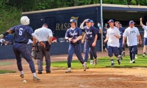 Jacksonville players celebrate Saturday after Xaye Lemon scored the walk-off run in the fifth inning of Game 3 of the their first-round Class 5A playoff series against John Carroll Catholic. (Photo by Joe Medley/East Alabama Sports Today)