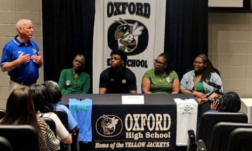 Bevill State Community College men’s basketball Coach Billy Conner speaks during Monday’s ceremony to celebrate Oxford High standout Jayden Lewis’ signing to play for the school.
