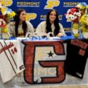 Piedmont’s Cacey Brothers (left) and Cayla Brothers participate in Monday’s ceremony to celebrate their signings to play softball for Gadsden State Community College. (Photo by Joe Medley/East Alabama Sports Today)