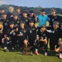 Oxford’s boys’ soccer team celebrates after winning the Calhoun County Tournament. The Yellow Jackets beat Pinson Valley in a first-round playoff match on Thursday. (Photo by Joe Medley/East Alabama Sports Today)