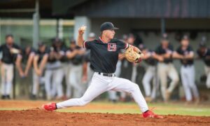 Pitcher Raeden Sumner delivers a pitch in Thursday's match up against Coastal.