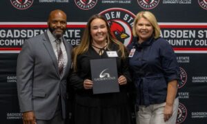 Tommie Goggans, president of the Cardinal Foundation and Hillary Folsom, director of advancement and alumni relations for Gadsden State, are pictured with scholarship recipient, Kayleigh Lee.