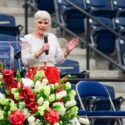 resident Kathy Murphy addresses faculty and staff at convocation in February 2025.