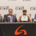 CoMeT signing.jpg: A Gadsden State student commits to employment with a regional employer during the workforce signing event.