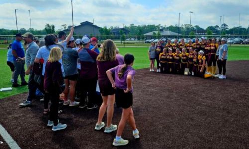 Spring Garden’s softball team poses for pictures after claiming the Class 1A East Regional title on Wednesday at Albertville’s Sand Mountain Park and clinching another state tournament berth. (Photo by Joe Medley/East Alabama Sports Today)