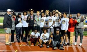 Weaver’s boys celebrate after winning their first state track championship Saturday at Cullman. (Submitted photo)