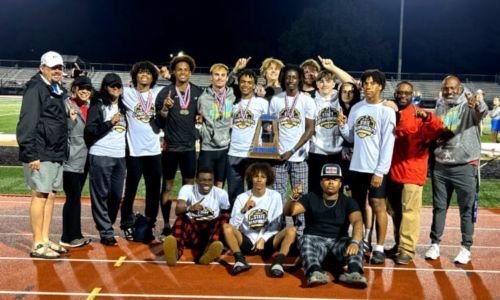 Weaver’s boys celebrate after winning their first state track championship Saturday at Cullman. (Submitted photo)