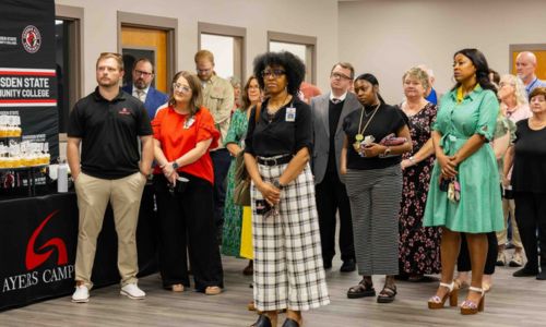 Attendees listen to remarks from speakers ranging from leadership to alumni.