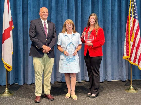 From left to right: Chief Deputy AG Clay Crenshaw, Carolyn Potter and Investigator Jessica Wilson.