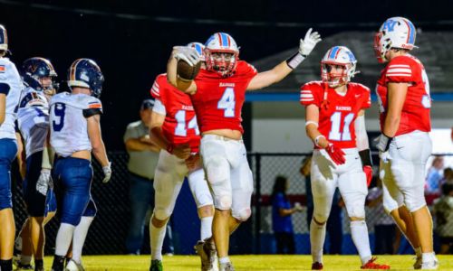 Pleasant Valley’s Kayden Vick celebrates one of his three touchdown runs against Woodland on Friday at Pleasant Valley. (Photo by Brad Campbell/sport-shutter.com)