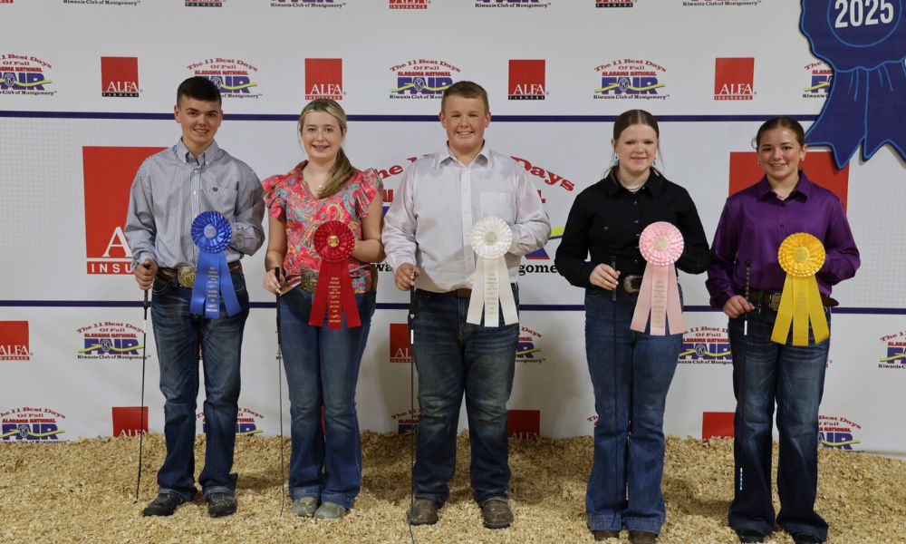 Intermediate Showmanship winners in the Youth Swine Show at the Alabama National Fair Oct. 12 in Montgomery were, from left, Colton Simpson of DeKalb County, first place; Makenna Martin of Tallapoosa County, second place; Tripp McMurray of Lee County, third place; Abigail Cone of Calhoun County, fourth place; and Macie Simpson of DeKalb County, fifth place. The intermediate division is for students 13-15 years of age. Alabama Farmers Federation and Alfa Insurance sponsored youth livestock activities at the fair.