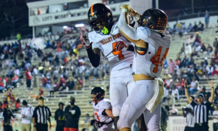 Alexandria’s Evan White (4) and Ryan Brown (44) celebrate a touchdown during a game at Anniston on Sept. 12. Alexandria will play host to Cherokee County in one of several key region games involving area teams this week. (Photo by Brad Campbell/sport-shutter.com)