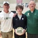 Faith Christian’s Parker Roberson poses with his father Barry (left) and Faith coach Doug Ward during Tuesday’s ceremony to celebrate his having scored 1,000 career points. (Submitted photo)
