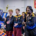 Piedmont wrestlers accept their second-place trophy after Saturday’s Piedmont Dogfight. (Photo by Brad Campbell/sport-shutter.com)