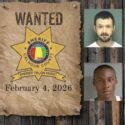 Wanted poster with sheriff star nailed to wooden background with 5 mugshots
