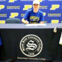 Piedmont’s Caden Wood participates in Wednesday’s ceremony to celebrate his signing with Snead State Community College. (Photo by Shannon Fagan/WEIS sports director)