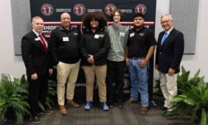 Left to right: Alan Smith, President of Gadsden State Community College; Robert Haynes, Human Resources Director at Tyler Union; Bryant McCarney; Benjamin Brady; Gael Chino; and Eric Crabtree, President of the Cardinal Foundation