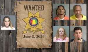 Wanted photo with 5 mugshots on old west wood planked wall with wanted poster and Sheriff's Office star