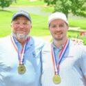 Lewis LeCroy (left) and Jacob LeCroy celebrate Tuesday after winning the AGA Father-Son Championship in Birmingham. (Submitted picture)