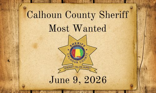 Old west parchment with Calhoun County Sheriff Most Wanted words and Sheriff Star