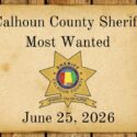 Old west parchment with Calhoun County Sheriff Most Wanted words and Sheriff Star