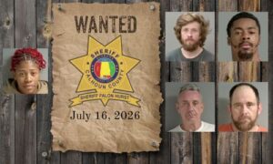 Wanted photo with 5 mugshots on old west wood planked wall with wanted poster and Sheriff's Office star