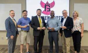 Pictured from left to right are Alan Smith, President of Gadsden State Community College; Jonathan Tang; Davis Varner; Tommie Goggans III; Major General Eric Crabtree; and Hillary Folsom, Director of Advancement and Alumni Relations at Gadsden State Community College