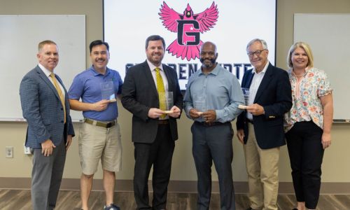 Pictured from left to right are Alan Smith, President of Gadsden State Community College; Jonathan Tang; Davis Varner; Tommie Goggans III; Major General Eric Crabtree; and Hillary Folsom, Director of Advancement and Alumni Relations at Gadsden State Community College
