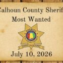 Old west parchment with Calhoun County Sheriff Most Wanted words and Sheriff Star