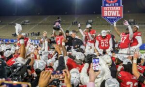 Jax State football players and Coach Charles Kelly celebrate after beating Troy in last season’s IS4S Salute to Veterans Bowl. The Gamecocks open the 2026 season Aug. 29 at North Dakota State. (Photo by Brad Campbell/sport-shutter.com)