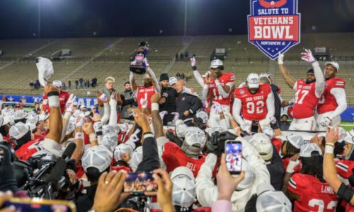 Jax State football players and Coach Charles Kelly celebrate after beating Troy in last season’s IS4S Salute to Veterans Bowl. The Gamecocks open the 2026 season Aug. 29 at North Dakota State. (Photo by Brad Campbell/sport-shutter.com)
